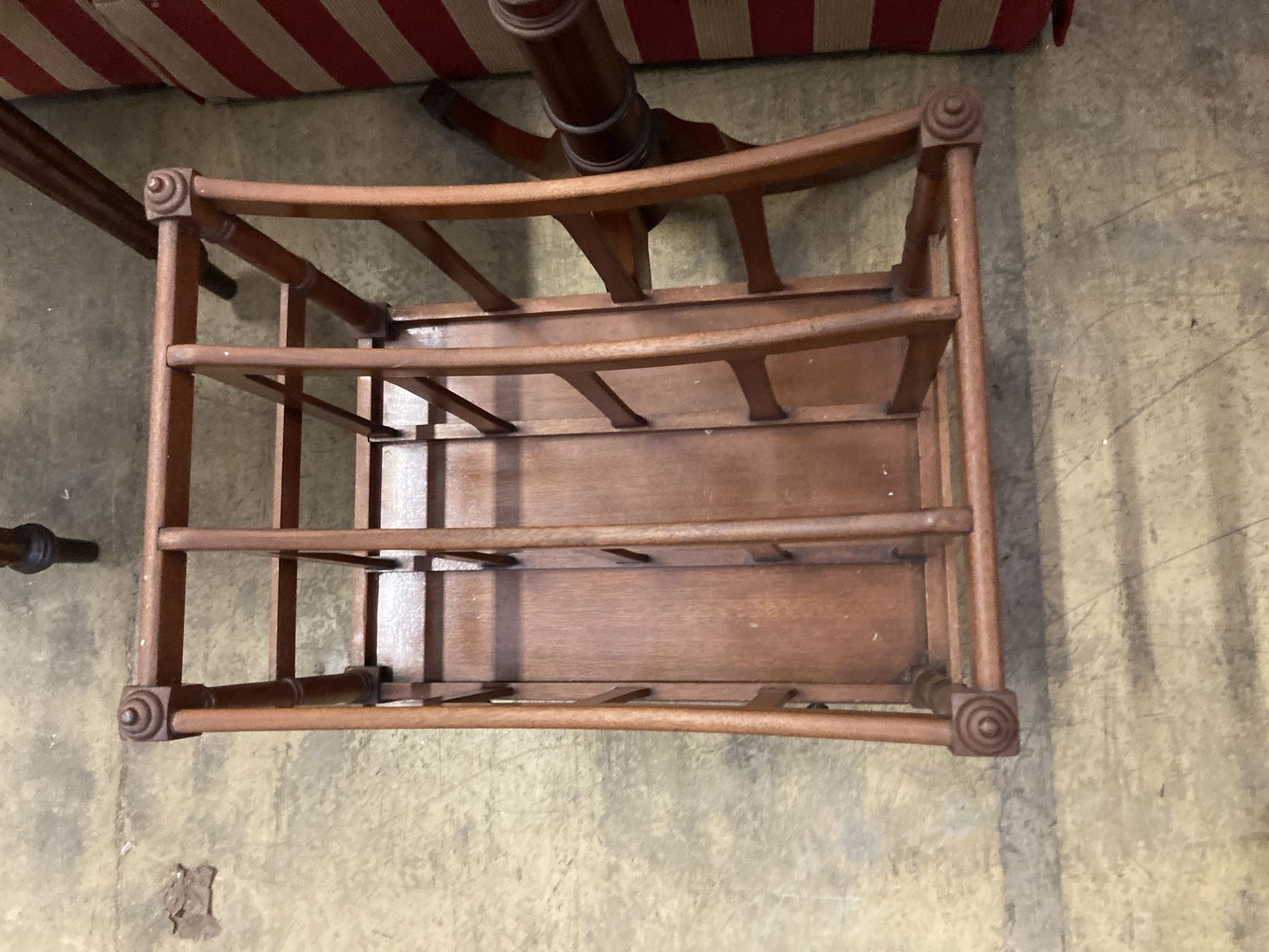 A reproduction Regency design mahogany duet music stand, width 52cm and music canterbury by Restall Brown and Clennell, Lewes